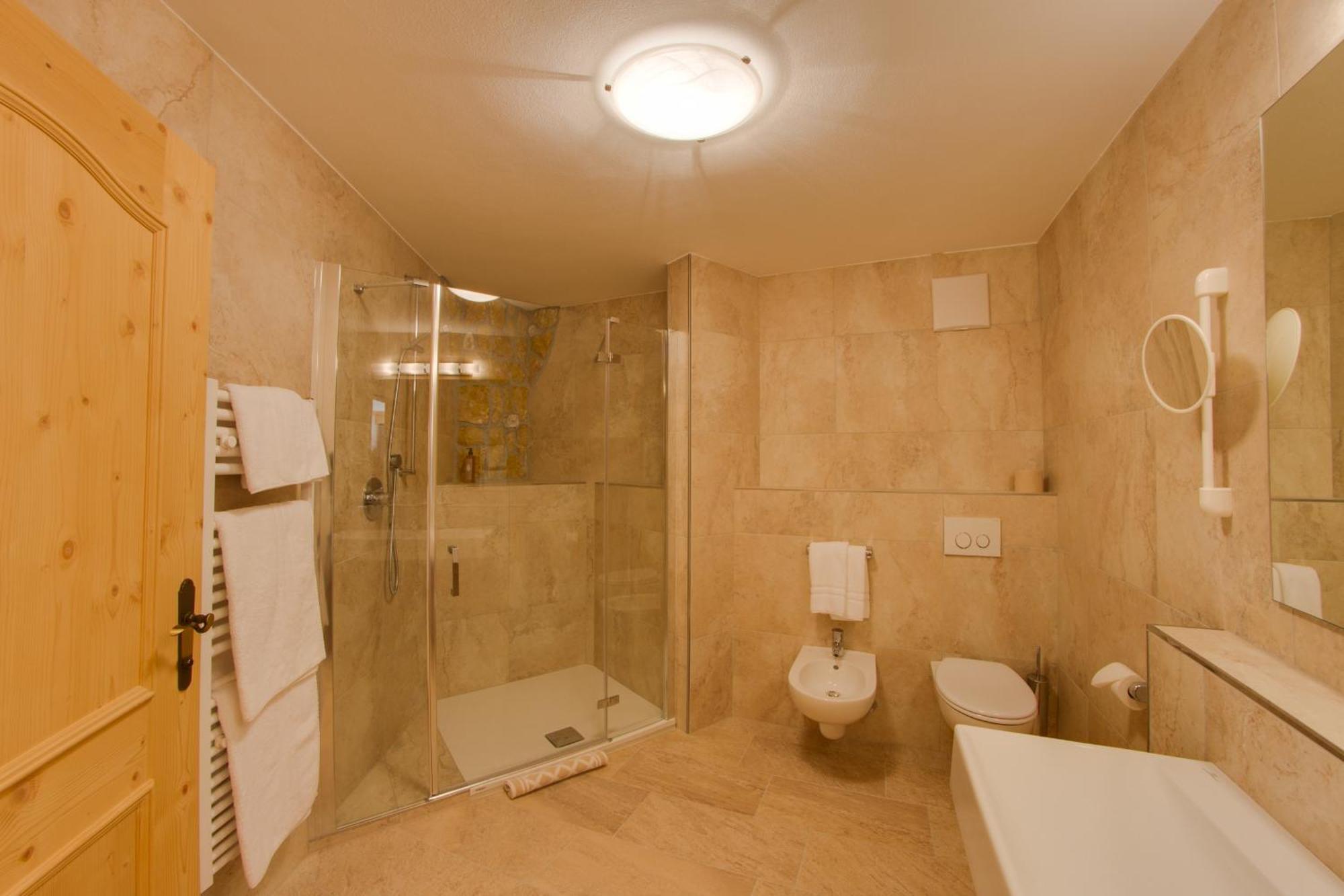 Dorfhotel Beludei Santa Cristina Val Gardena 部屋 写真